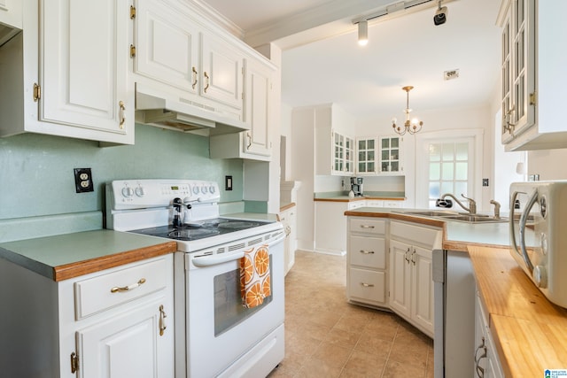 kitchen with white cabinets, hanging light fixtures, electric stove, a notable chandelier, and wood counters