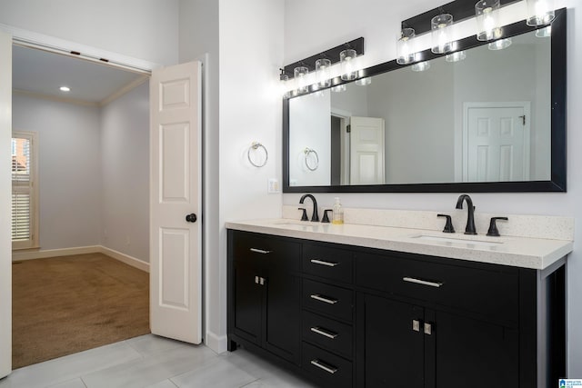 bathroom with vanity, tile patterned floors, and crown molding