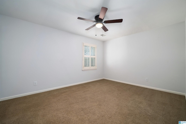 unfurnished room featuring carpet and ceiling fan