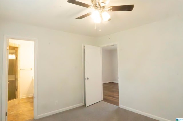 unfurnished bedroom featuring ceiling fan