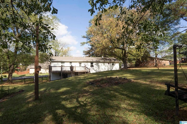 view of yard featuring a deck