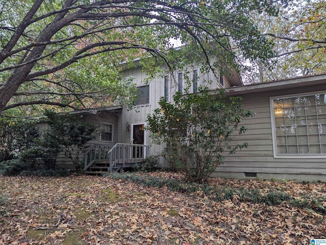 904 Marble Quarry Rd, Talladega, AL 35160 - back of house featuring board and batten siding and crawl space