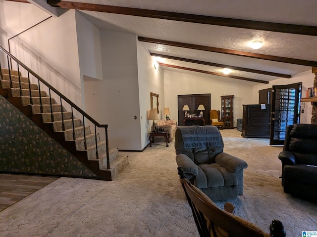 904 Marble Quarry Rd, Talladega, AL 35160 - living area with stairs and carpet flooring