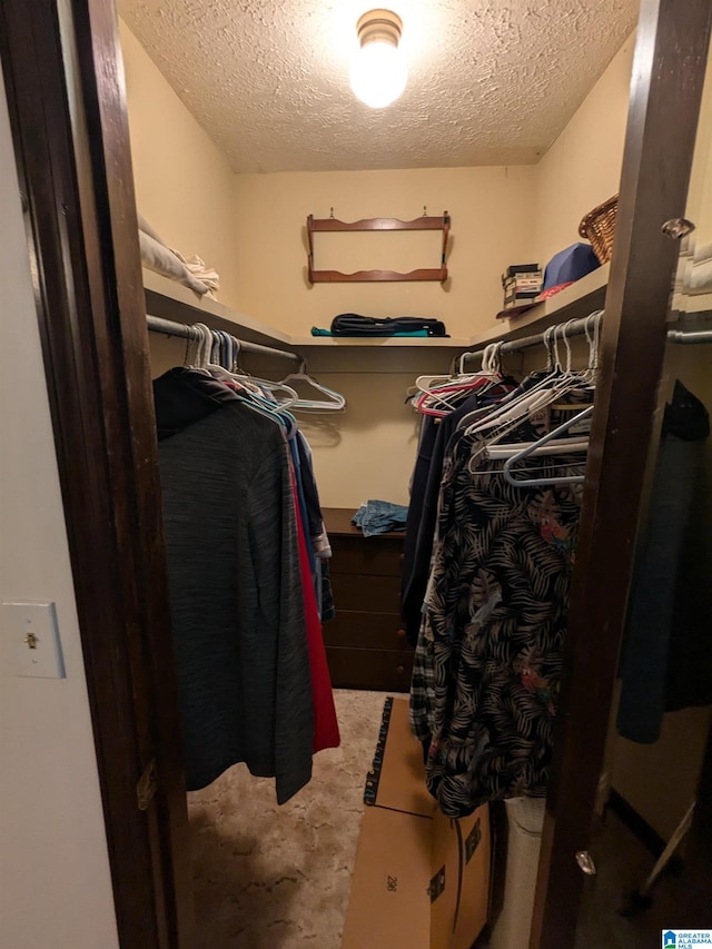 spacious closet featuring tile patterned flooring