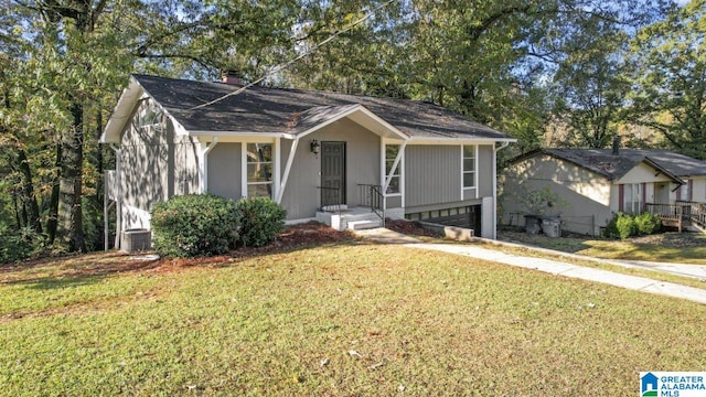 view of front of property with a front lawn