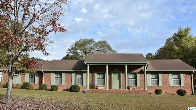 ranch-style house with a front lawn