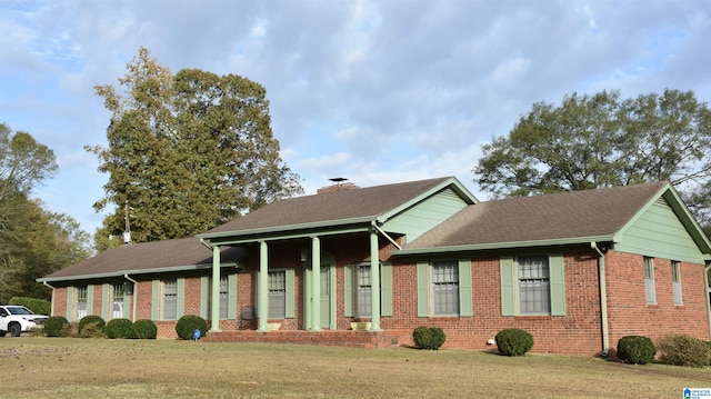 view of front of home with a front yard