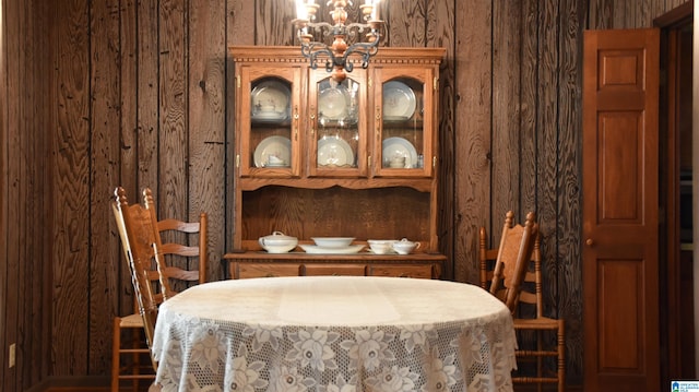 dining space featuring a chandelier