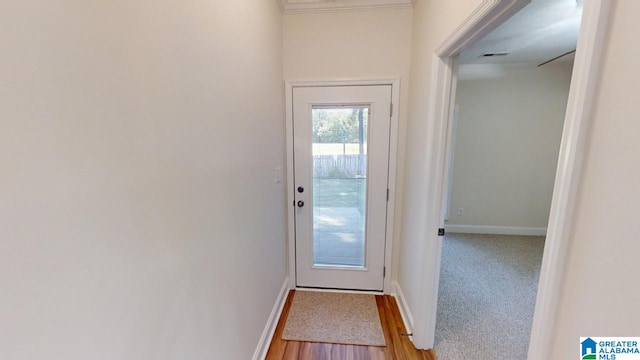 doorway to outside featuring hardwood / wood-style flooring