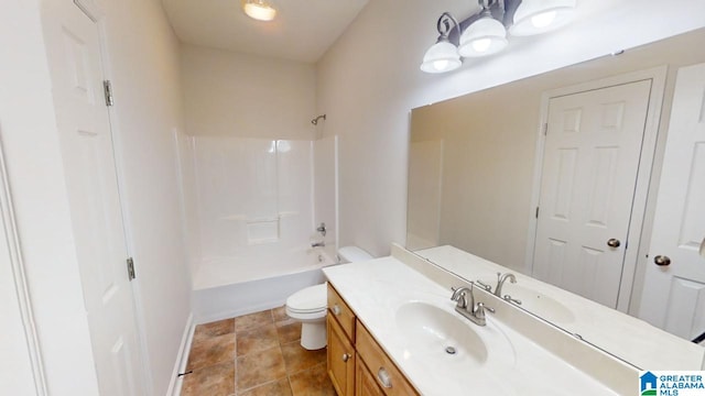 full bathroom featuring tile patterned flooring, vanity, toilet, and tub / shower combination