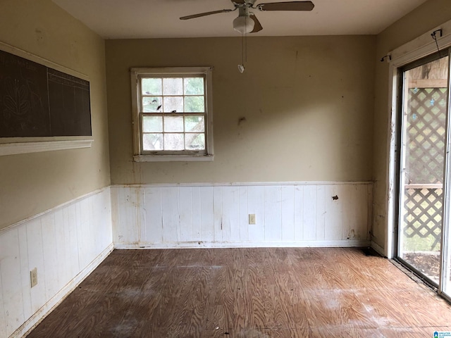 spare room featuring light hardwood / wood-style floors and ceiling fan