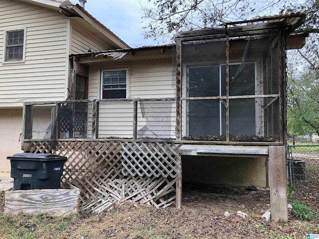 view of side of property featuring central AC