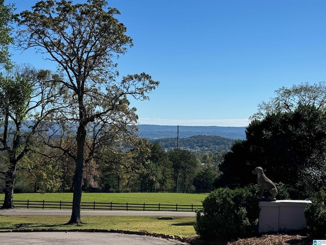 view of mountain feature with a rural view