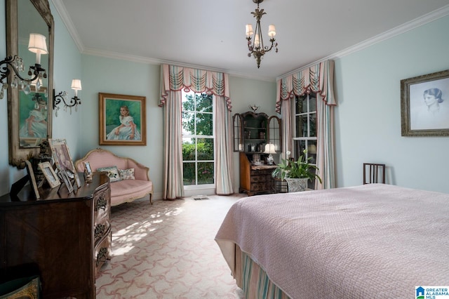 carpeted bedroom with ornamental molding and a chandelier