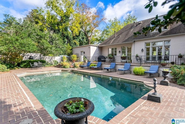 view of pool with a patio