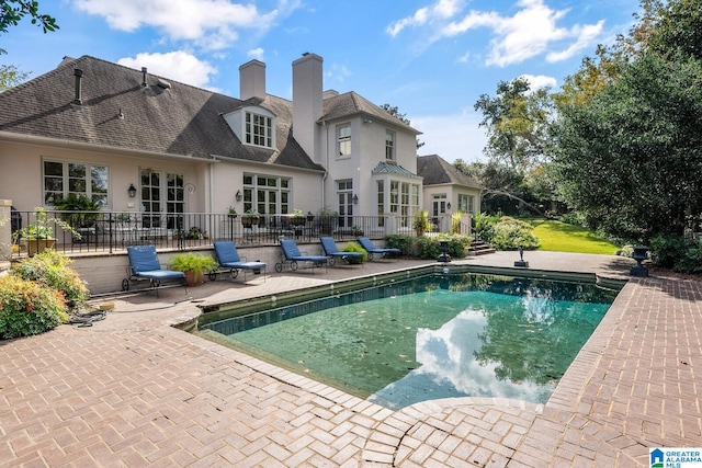 view of pool with a patio