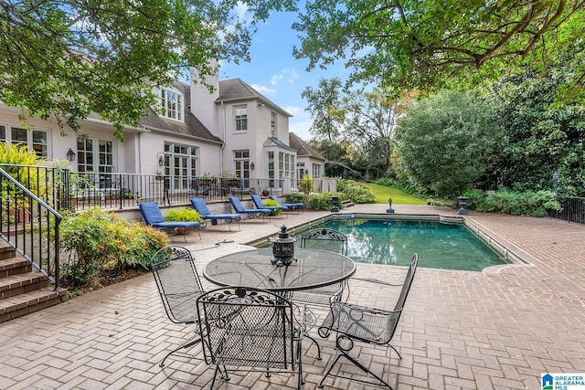 view of pool with a patio area