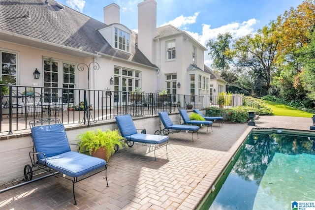 exterior space with french doors and a patio