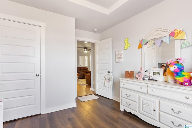 bedroom featuring dark hardwood / wood-style flooring