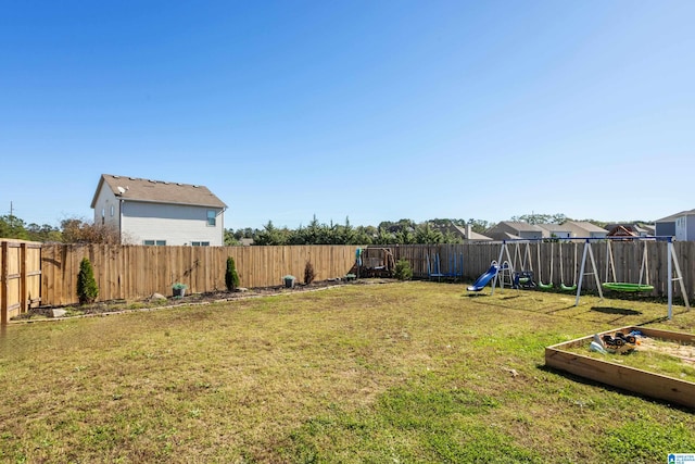 view of yard with a playground