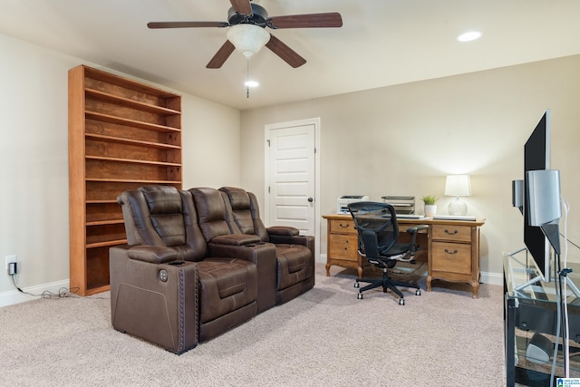 office area with ceiling fan and light colored carpet