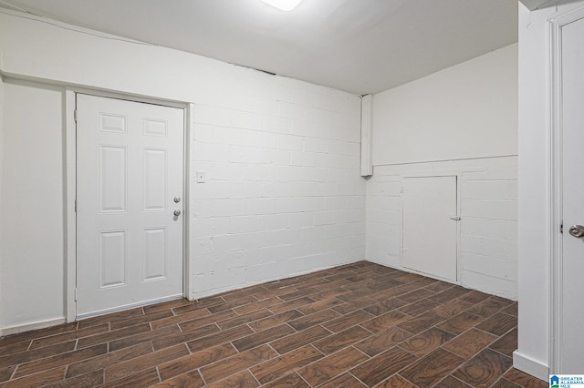 empty room featuring dark hardwood / wood-style flooring