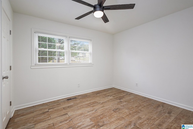 unfurnished room featuring ceiling fan and light hardwood / wood-style floors