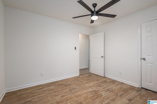 unfurnished bedroom with ceiling fan and light hardwood / wood-style floors