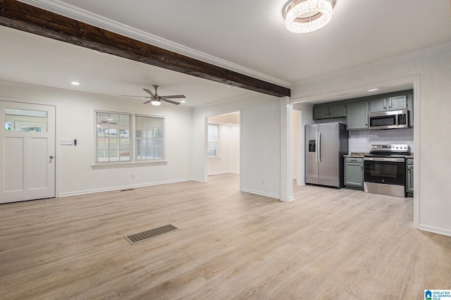 unfurnished living room with light hardwood / wood-style flooring, ceiling fan, and crown molding