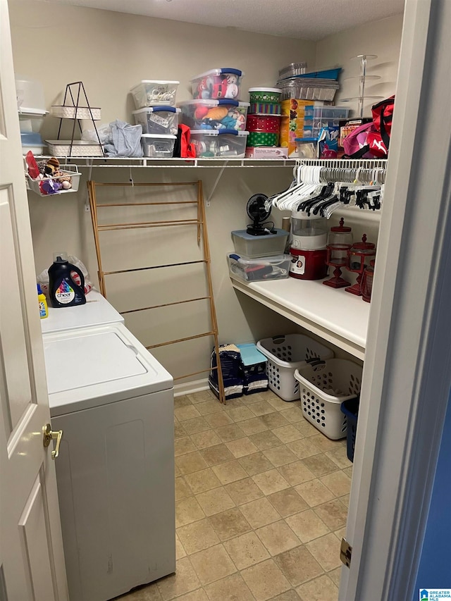 laundry room featuring separate washer and dryer