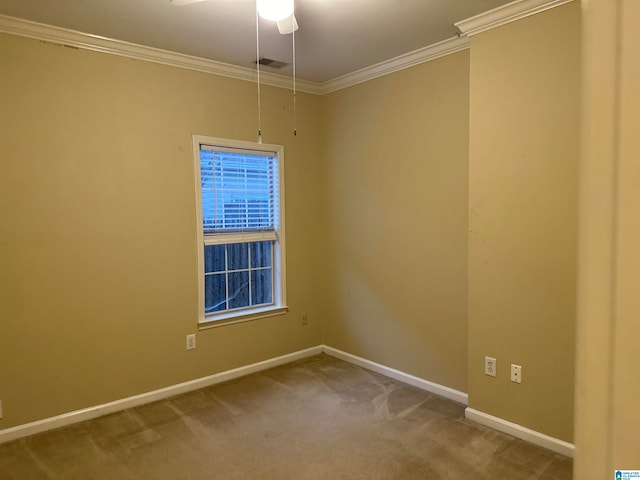 unfurnished room with carpet flooring, ceiling fan, and ornamental molding