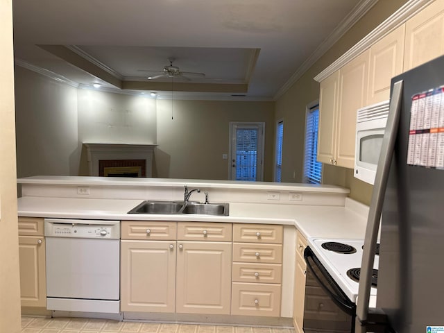 kitchen featuring ceiling fan, sink, white appliances, and ornamental molding