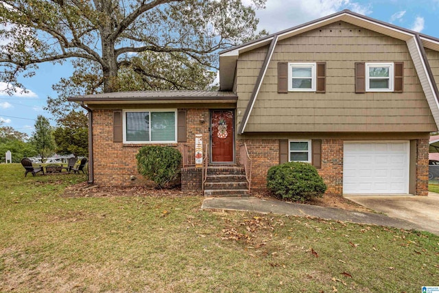 split level home featuring a front yard and a garage