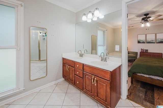 bathroom featuring tile patterned floors, ceiling fan, vanity, and ornamental molding