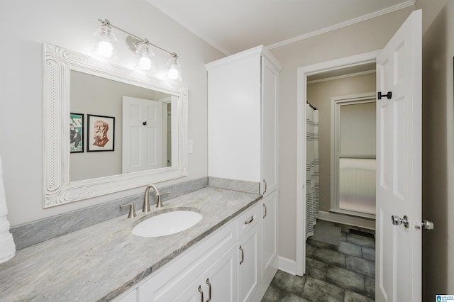 bathroom with vanity and ornamental molding