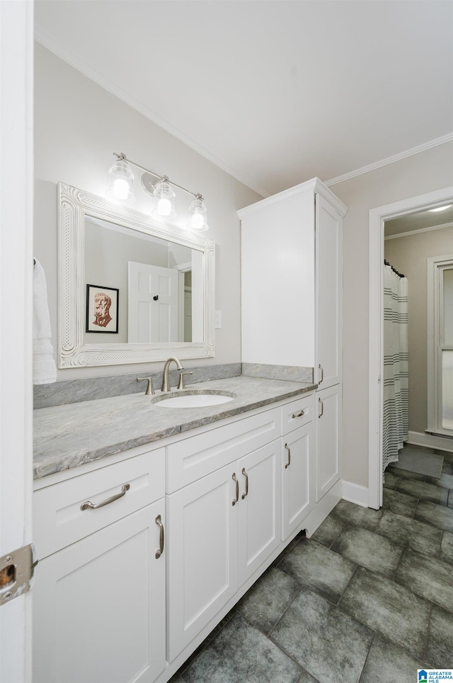 bathroom featuring tile patterned flooring, vanity, and ornamental molding