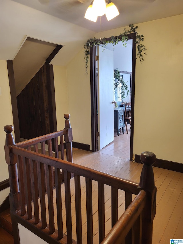 staircase featuring hardwood / wood-style floors