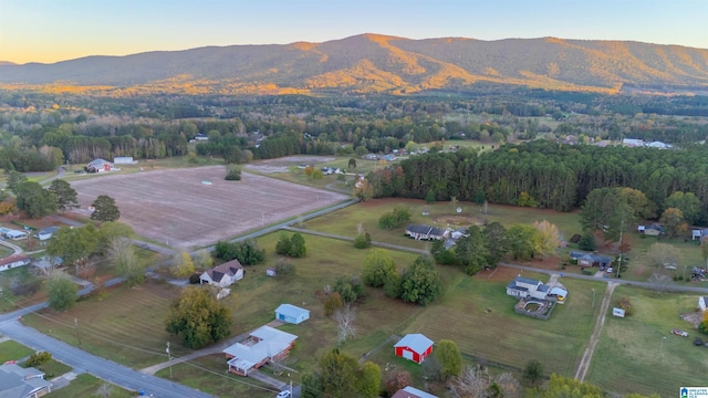 aerial view at dusk with a mountain view