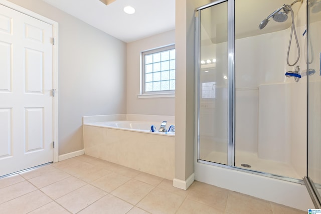 bathroom featuring tile patterned floors and plus walk in shower