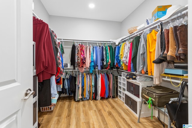 walk in closet featuring hardwood / wood-style floors