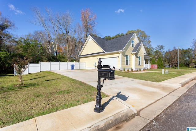 view of side of home with a lawn