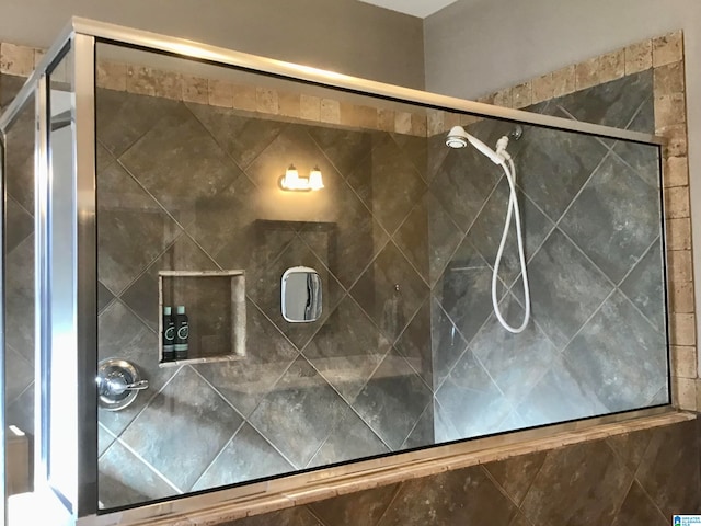 bathroom with an enclosed shower