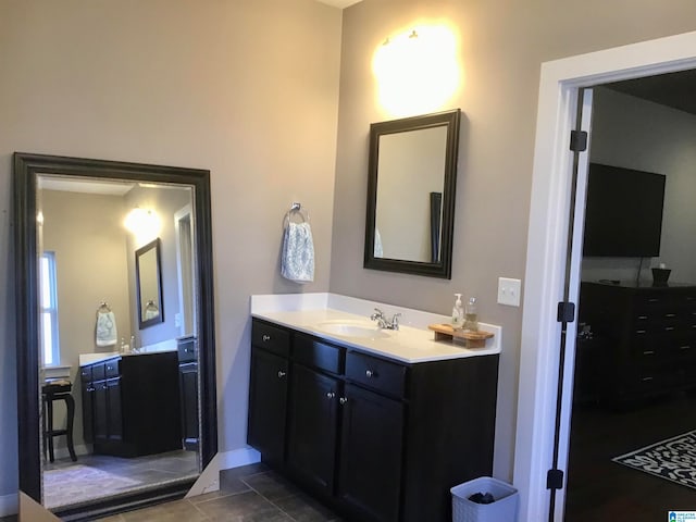 bathroom with vanity and tile patterned floors