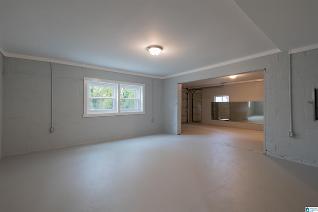 unfurnished room with concrete flooring