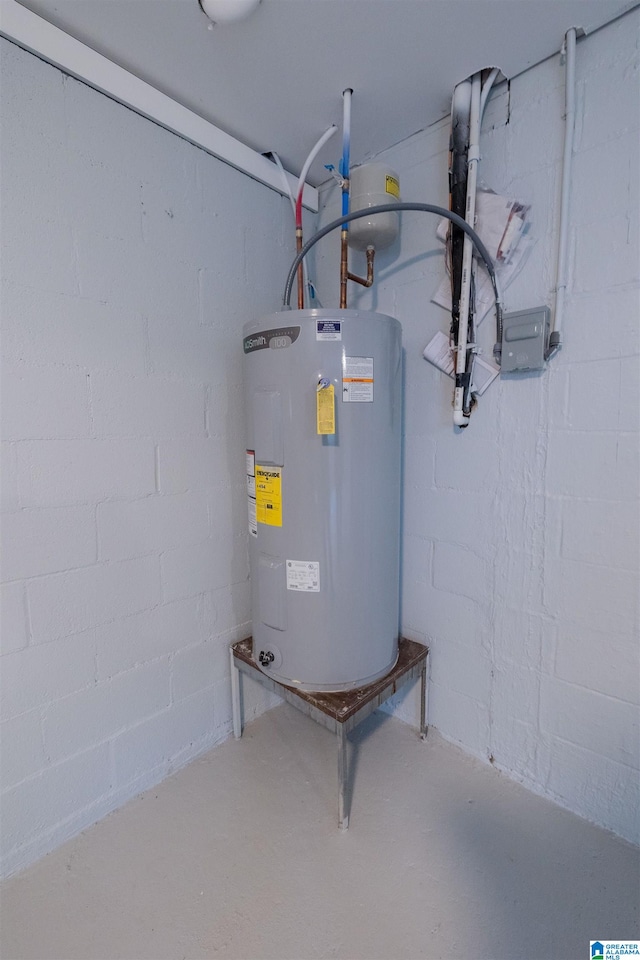 utility room featuring electric water heater