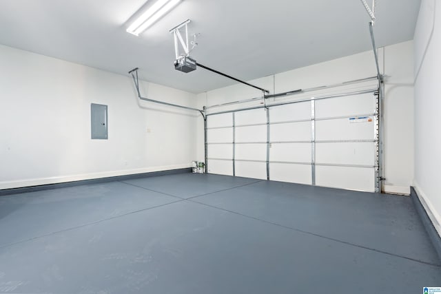 garage with electric panel and a garage door opener