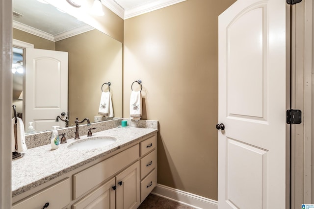 bathroom featuring vanity and crown molding