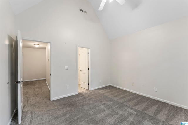 unfurnished bedroom featuring ceiling fan, carpet floors, and high vaulted ceiling