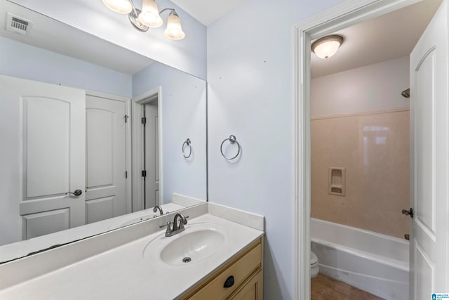 full bathroom with tile patterned floors, vanity, bathing tub / shower combination, and toilet