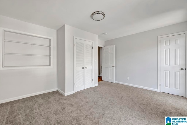 unfurnished bedroom with carpet